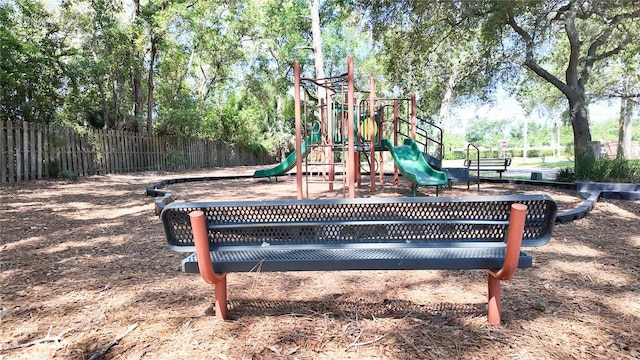 2343 Walnut Heights Rd, Apopka, FL 32703 - communal playground featuring fence and view of scattered trees