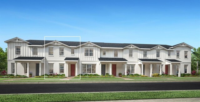 1664 Crowncrest Dr, Apopka, FL 32703 - townhome / multi-family property featuring board and batten siding