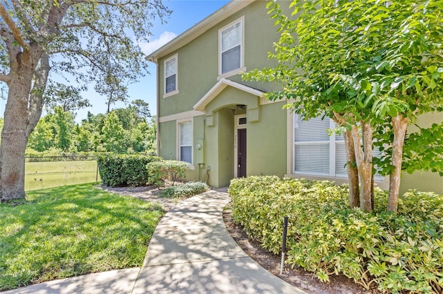 2430 Little Gem Loop, Sanford, FL 32773 - view of property with stucco siding
