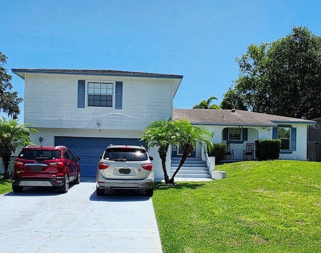 656 Little Wekiva Rd, Altamonte Springs, FL 32714 - view of front of property with concrete driveway, a garage, and a front yard