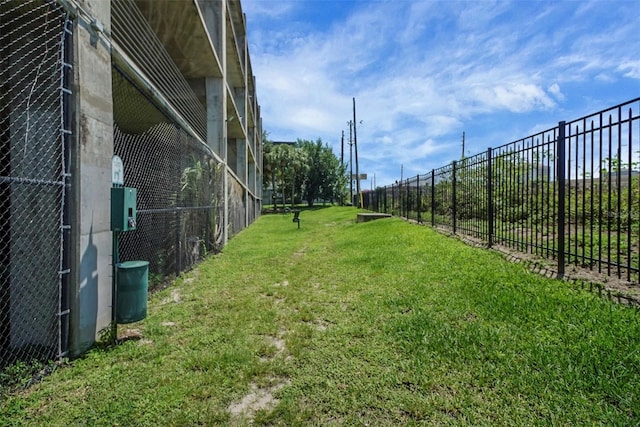 view of yard with fence