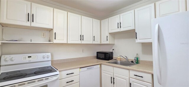 1504 Virginia Ave Unit 105, Daytona Beach, FL 32114 - kitchen with white appliances, a sink, white cabinetry, light countertops, and crown molding