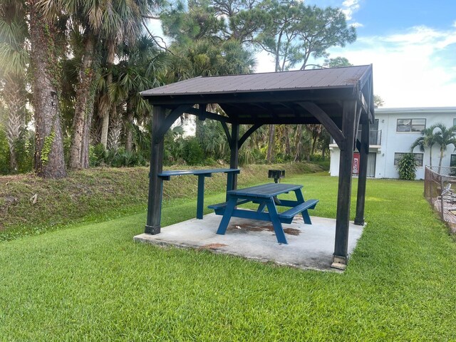 1504 Virginia Ave Unit 105, Daytona Beach, FL 32114 - view of community with a gazebo, a yard, and a patio area