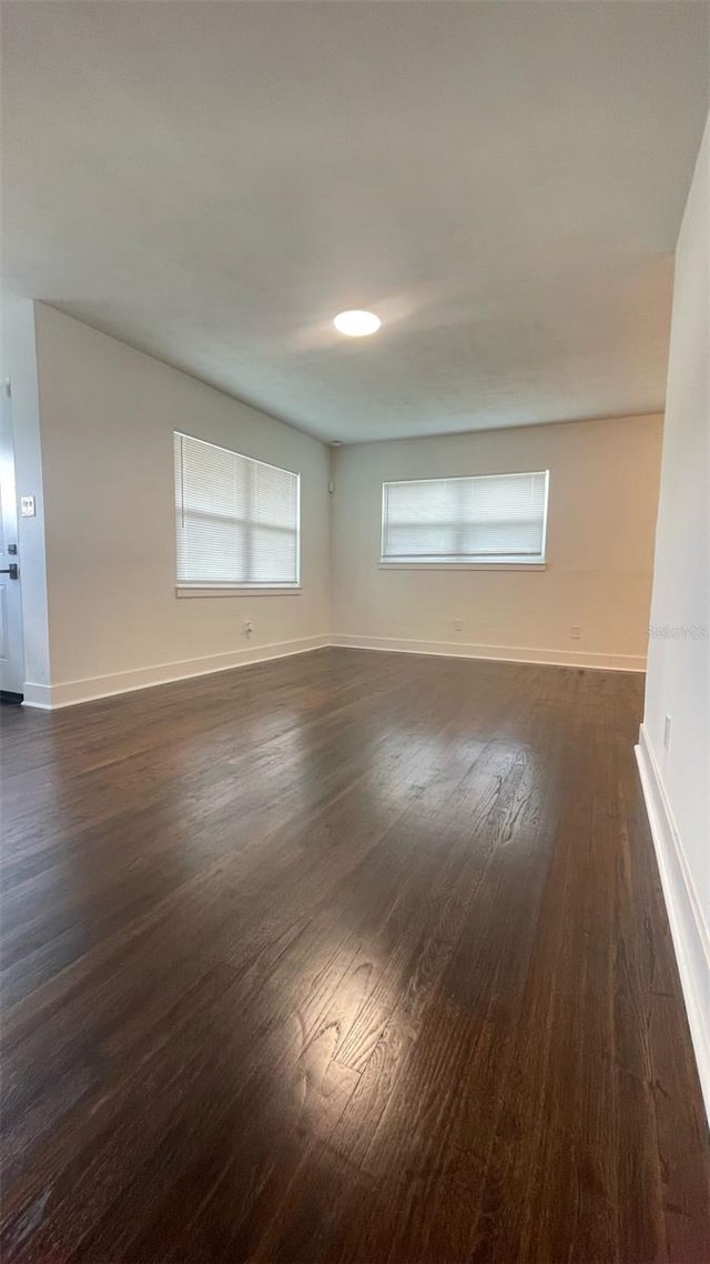 331 N Dollins Ave, Orlando, FL 32805 - unfurnished room featuring dark wood-type flooring and baseboards
