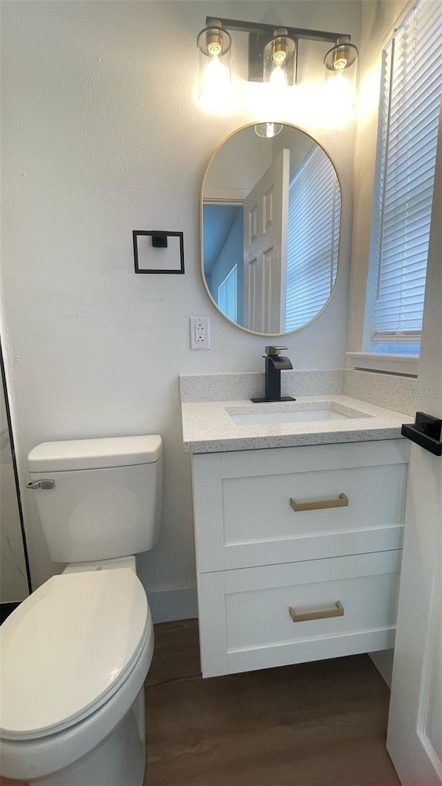 331 N Dollins Ave, Orlando, FL 32805 - bathroom featuring vanity and wood finished floors