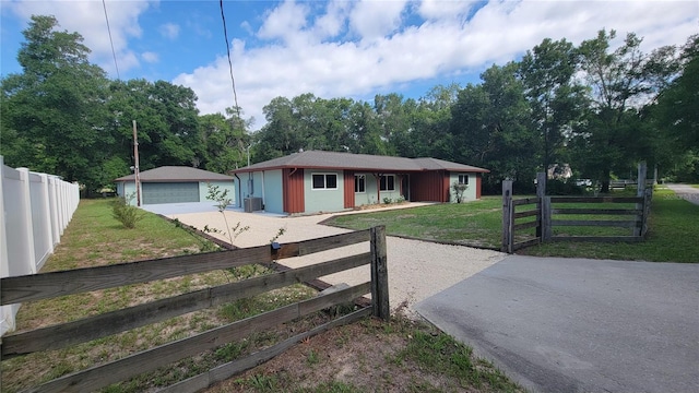 122 N Cedarview Ter, Inverness, FL 34453 - single story home with a garage, concrete driveway, and central AC unit