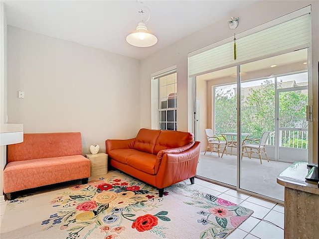 7323 Cypress Grove Rd Unit 87, Orlando, FL 32819 - living area featuring light tile patterned flooring