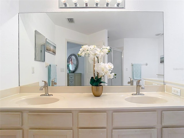 7323 Cypress Grove Rd Unit 87, Orlando, FL 32819 - full bathroom featuring double vanity and a shower stall