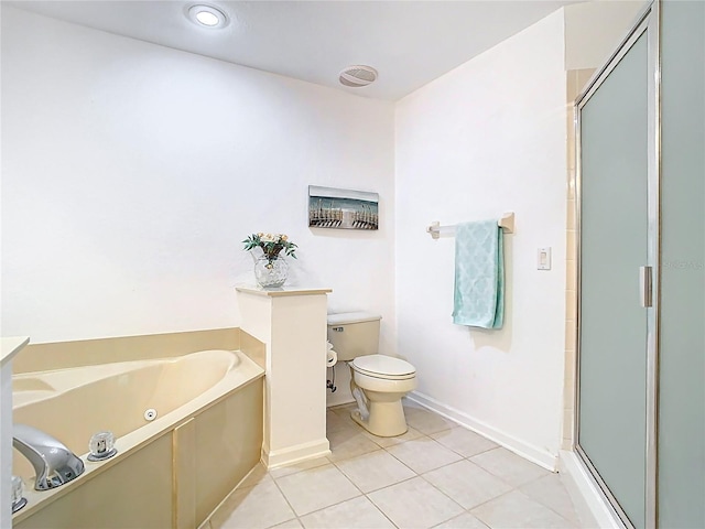 7323 Cypress Grove Rd Unit 87, Orlando, FL 32819 - bathroom featuring a tub with jets, a shower stall, toilet, baseboards, and tile patterned floors