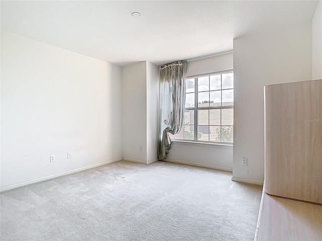 7323 Cypress Grove Rd Unit 87, Orlando, FL 32819 - unfurnished room featuring carpet and baseboards