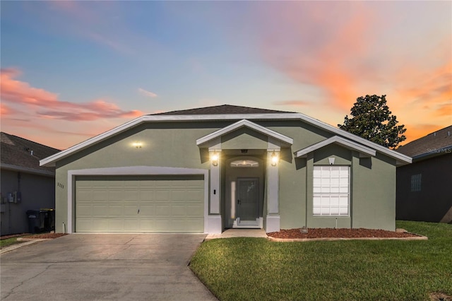 1111 High Vista Dr, Davenport, FL 33837 - view of front facade featuring concrete driveway, stucco siding, a front lawn, and an attached garage
