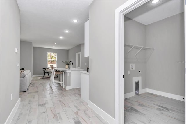 6805 SW 131st Cir, Ocala, FL 34481 - clothes washing area featuring hookup for an electric dryer, recessed lighting, washer hookup, and baseboards