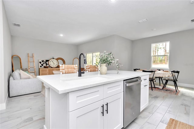 6805 SW 131st Cir, Ocala, FL 34481 - kitchen with a sink, stainless steel dishwasher, plenty of natural light, an island with sink, and recessed lighting