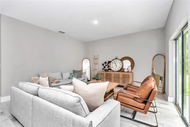 6805 SW 131st Cir, Ocala, FL 34481 - living area featuring baseboards and recessed lighting