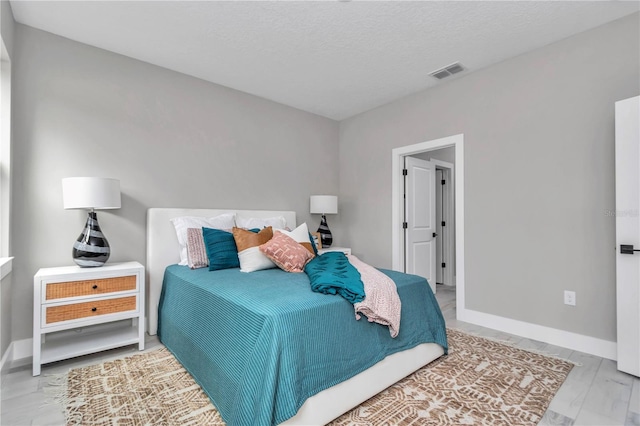 6805 SW 131st Cir, Ocala, FL 34481 - bedroom with baseboards and a textured ceiling