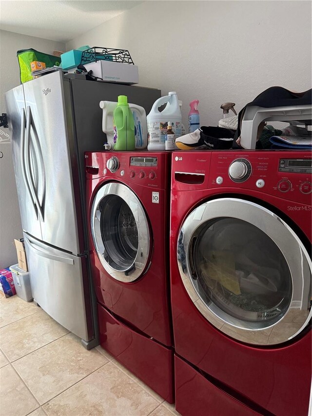 6800 SE 12th Pl, Ocala, FL 34472 - washroom featuring light tile patterned flooring and independent washer and dryer