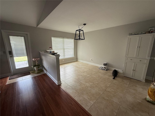 6800 SE 12th Pl, Ocala, FL 34472 - unfurnished dining area featuring baseboards and light tile patterned floors