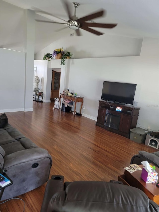6800 SE 12th Pl, Ocala, FL 34472 - living room featuring a ceiling fan, lofted ceiling, wood finished floors, and baseboards