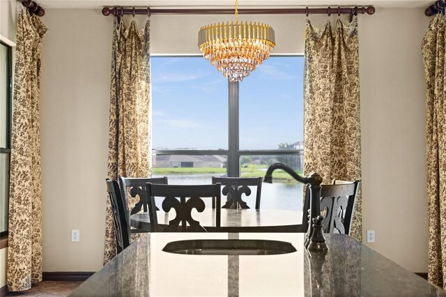 3041 Boating Blvd, Kissimmee, FL 34746 - dining room featuring a chandelier