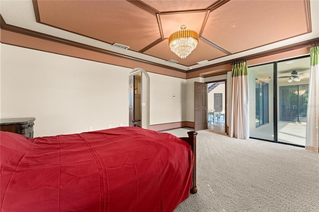 3041 Boating Blvd, Kissimmee, FL 34746 - carpeted bedroom featuring access to exterior, a chandelier, arched walkways, crown molding, and baseboards