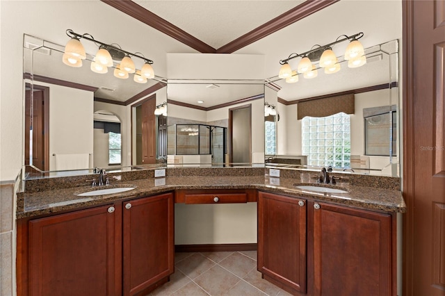 3041 Boating Blvd, Kissimmee, FL 34746 - bathroom featuring ornamental molding, a stall shower, tile patterned flooring, healthy amount of natural light, and double vanity