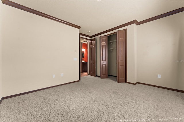 3041 Boating Blvd, Kissimmee, FL 34746 - unfurnished bedroom featuring crown molding, light colored carpet, baseboards, and a closet