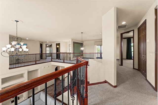 3041 Boating Blvd, Kissimmee, FL 34746 - hallway featuring a chandelier, an upstairs landing, carpet flooring, recessed lighting, and baseboards