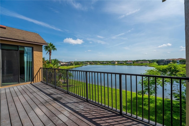 3041 Boating Blvd, Kissimmee, FL 34746 - wooden deck with a water view and a lawn