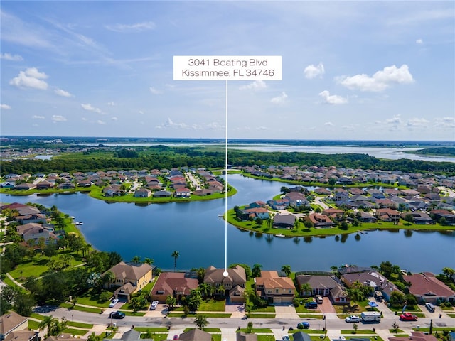 3041 Boating Blvd, Kissimmee, FL 34746 - aerial perspective of suburban area featuring a large body of water