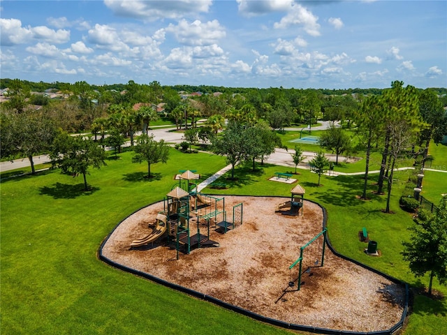 3041 Boating Blvd, Kissimmee, FL 34746 - view of community featuring a yard and view of scattered trees