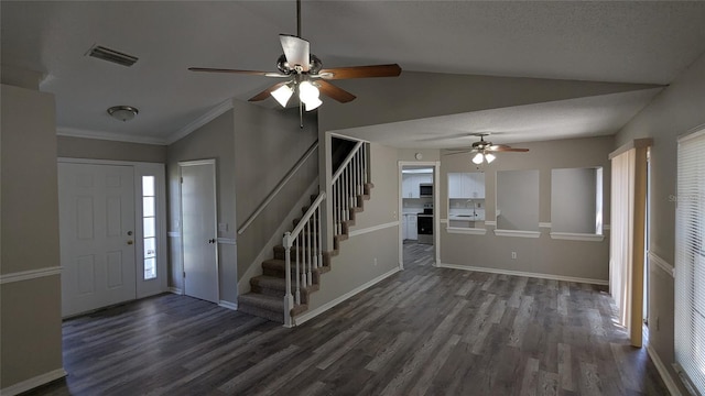 609 Whittingham Pl, Lake Mary, FL 32746 - entrance foyer with ceiling fan, vaulted ceiling, stairway, dark wood-style flooring, and plenty of natural light