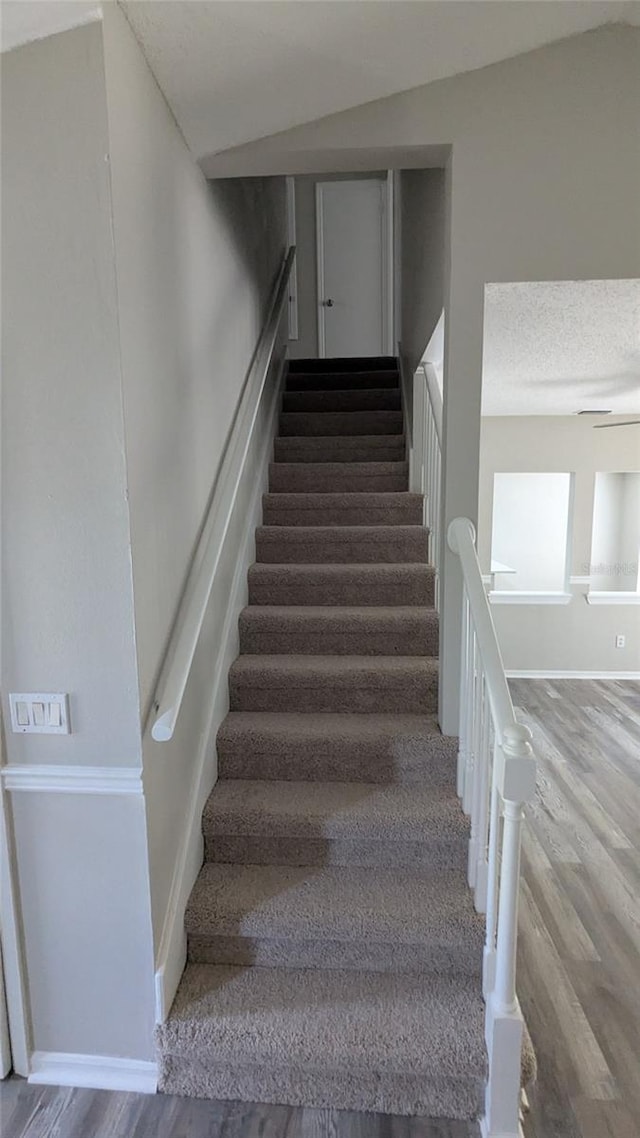 609 Whittingham Pl, Lake Mary, FL 32746 - staircase with wood finished floors and baseboards
