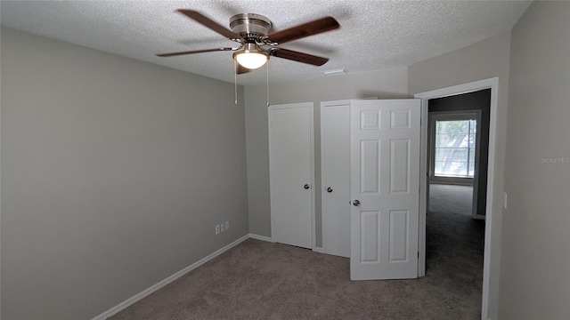 609 Whittingham Pl, Lake Mary, FL 32746 - unfurnished bedroom with carpet, a textured ceiling, ceiling fan, a closet, and baseboards