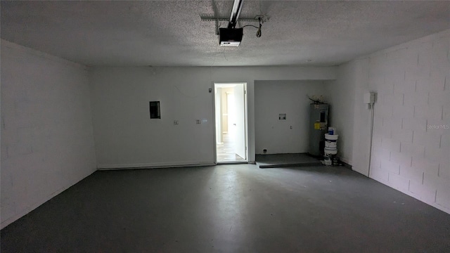 609 Whittingham Pl, Lake Mary, FL 32746 - garage featuring water heater, a garage door opener, concrete block wall, and electric panel