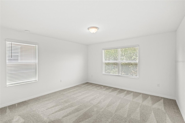 1396 Mirabella Cir, Davenport, FL 33897 - carpeted spare room featuring baseboards