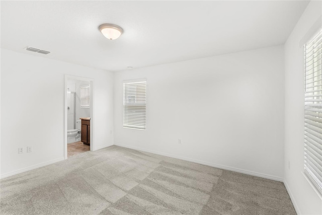 1396 Mirabella Cir, Davenport, FL 33897 - empty room featuring light carpet and baseboards