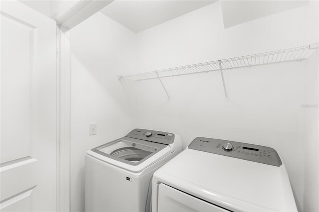 1396 Mirabella Cir, Davenport, FL 33897 - washroom featuring independent washer and dryer