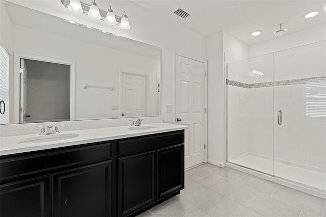9356 St Therese St, Groveland, FL 34736 - full bath featuring a shower stall and double vanity