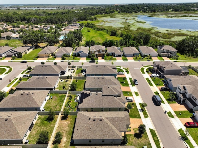9356 St Therese St, Groveland, FL 34736 - aerial perspective of suburban area featuring a nearby body of water