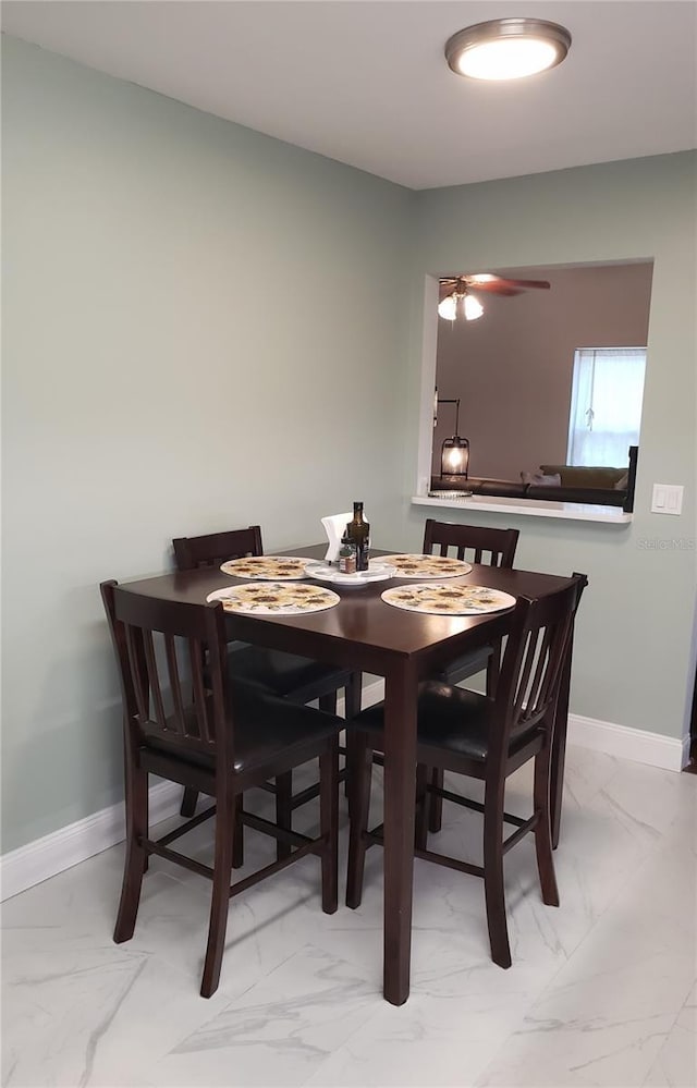 983 Bucksaw Pl, Longwood, FL 32750 - dining area featuring marble finish flooring, baseboards, and a ceiling fan