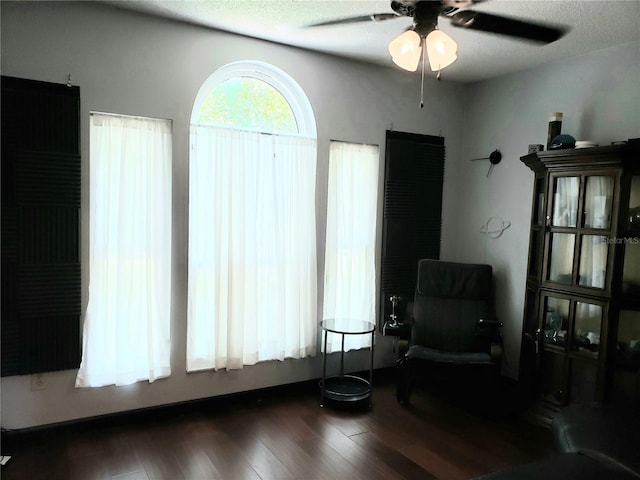 983 Bucksaw Pl, Longwood, FL 32750 - living area with a ceiling fan and dark wood-style floors