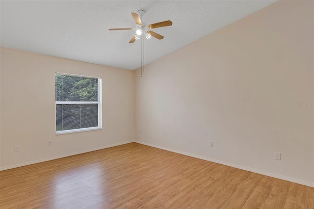 2714 Moncayo Ave, The Villages, FL 32162 - unfurnished room featuring light wood-style flooring, a ceiling fan, and baseboards