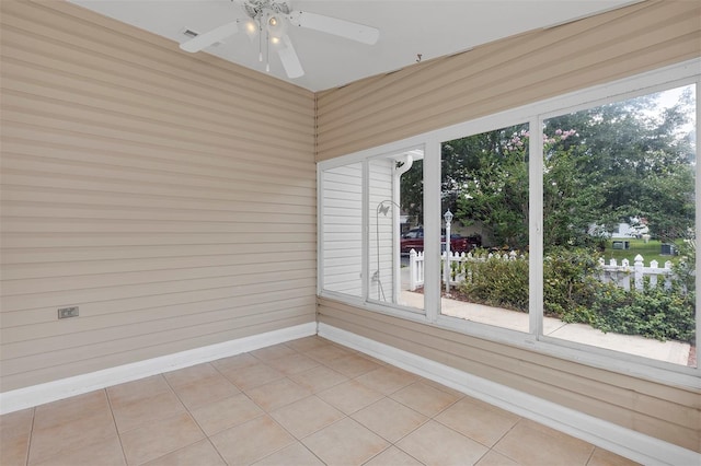 2714 Moncayo Ave, The Villages, FL 32162 - unfurnished sunroom featuring a ceiling fan