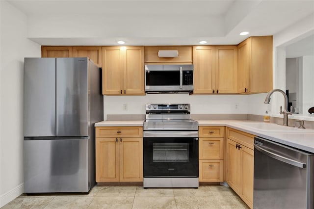 8248 Limetree Ct, Orlando, FL 32836 - kitchen with stainless steel appliances, a sink, light countertops, and recessed lighting