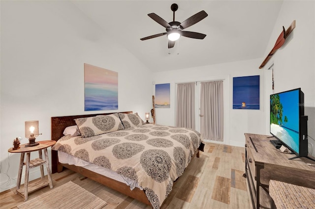 8248 Limetree Ct, Orlando, FL 32836 - bedroom with wood finished floors, vaulted ceiling, baseboards, and ceiling fan