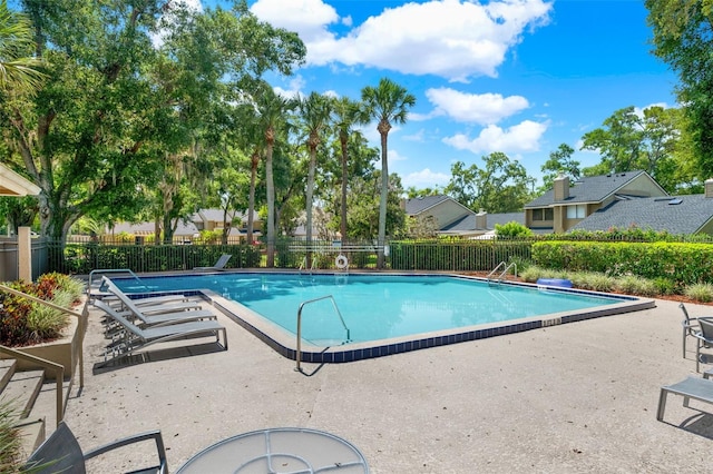 8248 Limetree Ct, Orlando, FL 32836 - community pool with a patio area