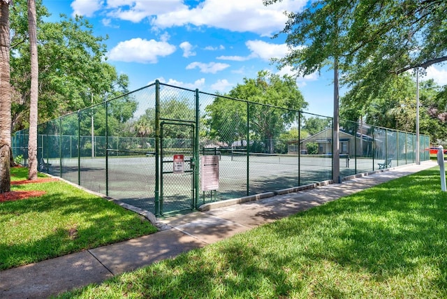 8248 Limetree Ct, Orlando, FL 32836 - view of tennis court with a gate