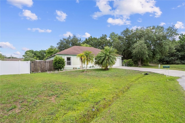 14 Sequoia Way, Kissimmee, FL 34758 - view of front of home featuring concrete driveway, a garage, and stucco siding