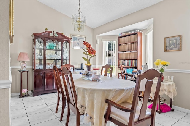 14 Sequoia Way, Kissimmee, FL 34758 - dining area featuring light tile patterned floors and a chandelier