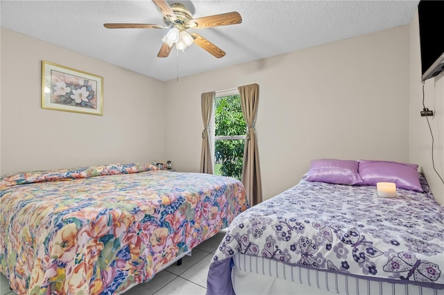 14 Sequoia Way, Kissimmee, FL 34758 - tiled bedroom with a textured ceiling and a ceiling fan
